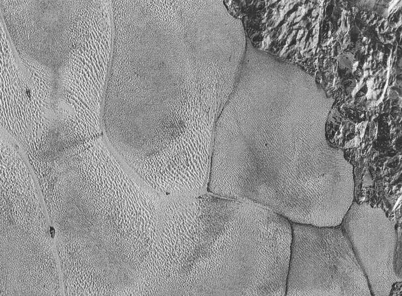 Illustration for article titled NASA’s New Photos Bring Pluto’s Surface Into Sharp Focus